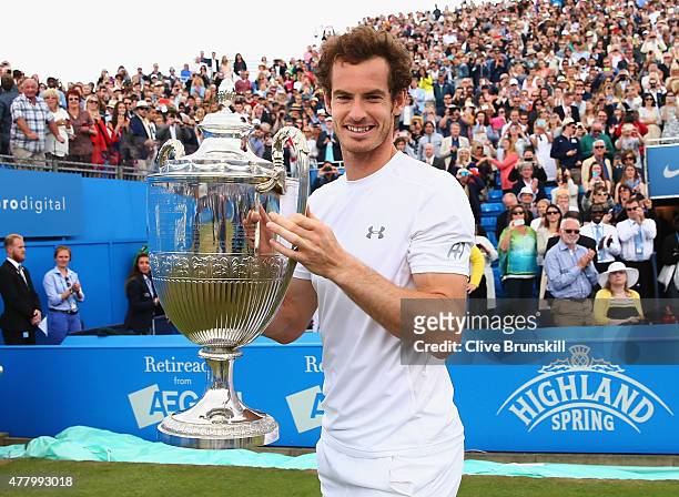 Andy Murray of Great Britain celebrates victory with the trophy after his men's singles final match against Kevin Anderson of South Africa during day...