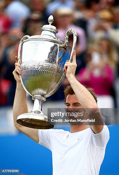 Andy Murray of Great Britain celebrates victory with the trophy after his men's singles final match against Kevin Anderson of South Africa during day...