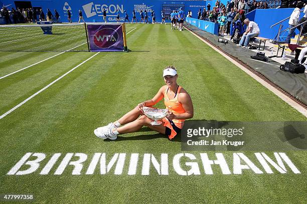 Angelique Kerber of Germany poses after victory in her singles final match against Karolina Pliskova of Czech Republic on day seven of the Aegon...
