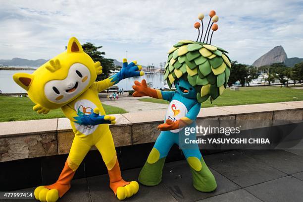 The mascots of the Rio 2016 Olympic Games Vinicius and Rio 2016 Paralympic Games Tom pose during a family running race event by the Cartoon Network...