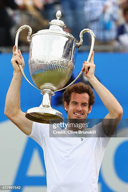 Andy Murray of Great Britain celebrates victory with the trophy after his men's singles final match against Kevin Anderson of South Africa during day...