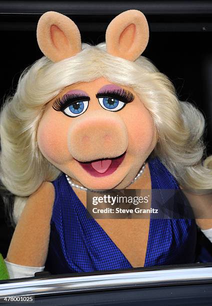 Miss Piggy arrives at the Disney's "Muppets Most Wanted" - Los Angeles Premiere at the El Capitan Theatre on March 11, 2014 in Hollywood, California.