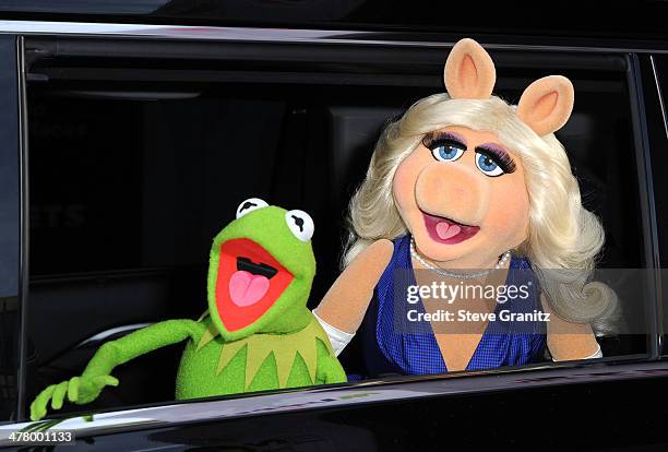Kermit the Frog and Miss Piggy arrives at the Disney's "Muppets Most Wanted" - Los Angeles Premiere at the El Capitan Theatre on March 11, 2014 in...
