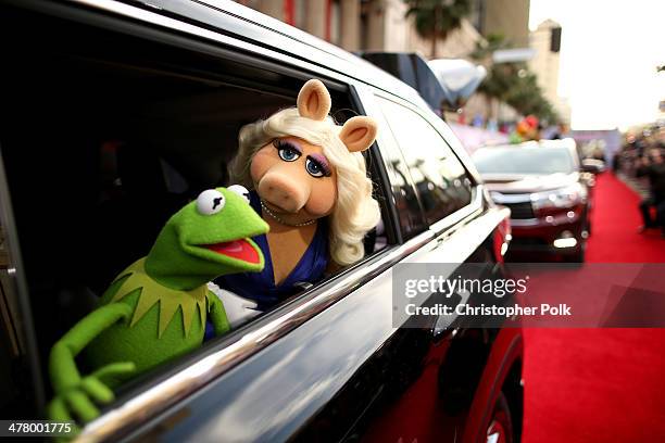 Kermit the Frog and Miss Piggy arrive at the world premiere of Disney's "Muppets Most Wanted" at the El Capitan Theatre on March 11, 2014 in...