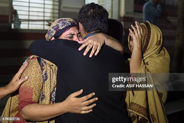 Relatives mourn the death of a heatwave victim at the EDHI morgue in Karachi on June 21, 2015. A heatwave has killed at least 45 people in Pakistan's...