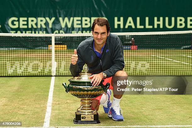 Roger Federer of Switzerland with the Championship Trophy after defeating Andreas Seppi of Italy at the Gerry Weber Open, on June 21, 2015 in Halle,...