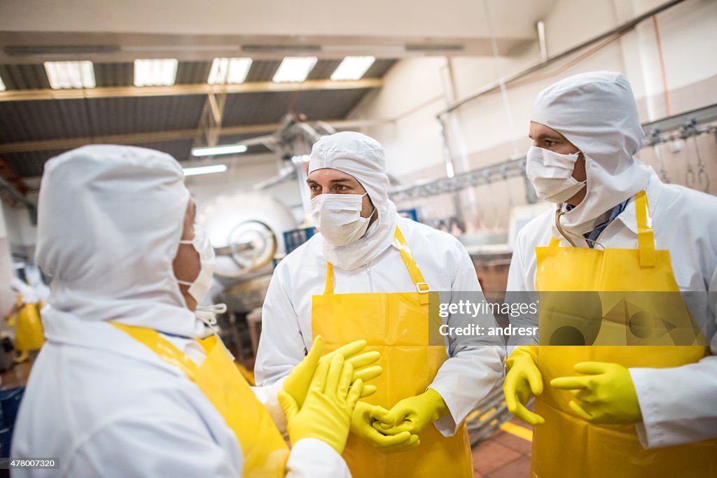 Men working at a food factory