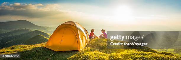 children tent camping on idyllic summer sunset mountain top panorama - camping family bildbanksfoton och bilder