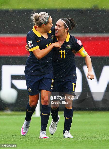 Kyah Simon of Australia celebrates with team mate Lisa De Vanna as she scores their first goal during the FIFA Women's World Cup 2015 round of 16...