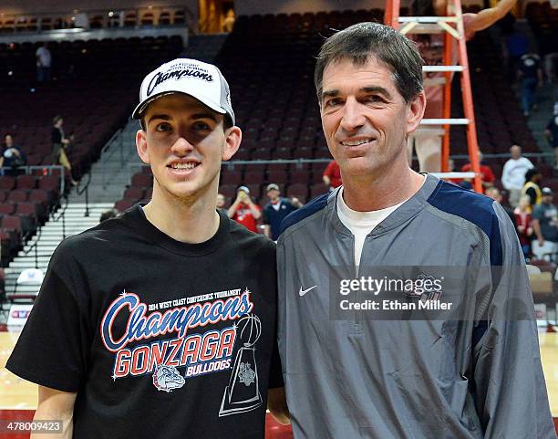 David Stockton of the Gonzaga Bulldogs poses with his father, former NBA player John Stockton, after the championship game of the West Coast...