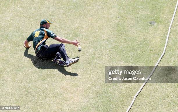 Seth Rance of Central slides in the prevent a boundary during the Ford Trophy Mens One-Day match between the Auckland Aces and Central Stags at Eden...