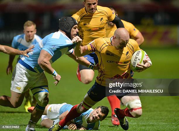 Ignatio Brex of Argentina Jaguars vies for the ball with Danut Dumbrava of Romania during "World Rugby Nations Cup" in Bucharest on June 21, 2015....