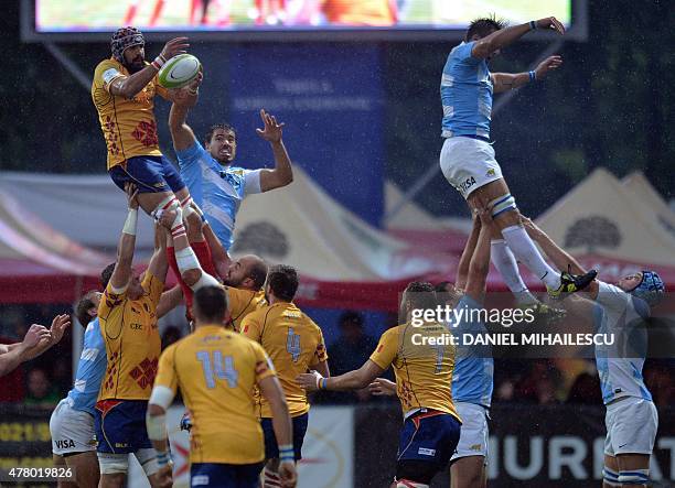 Martin Chiappesoni of Argentina Jaguars jumps for the ball with Viorel Lucaci of Romania during "World Rugby Nations Cup" in Bucharest June 21, 2015....