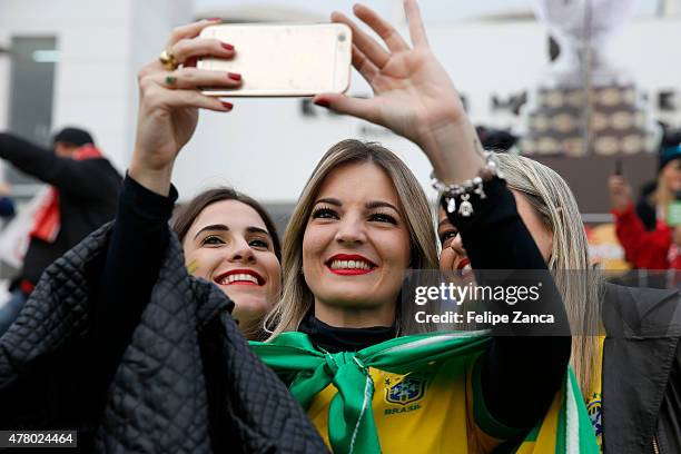 Fans of Brazil take a selfie prior the 2015 Copa America Chile Group C match between Brazil and Venezuela at Monumental David Arellano Stadium on...
