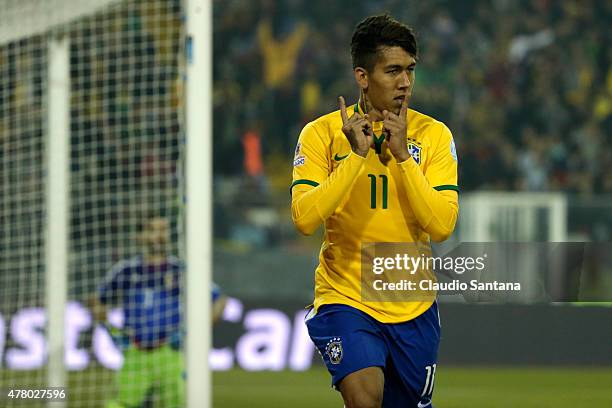 Roberto Firmino of Brazil celebrates after scoring the second goal of his team during the 2015 Copa America Chile Group C match between Brazil and...