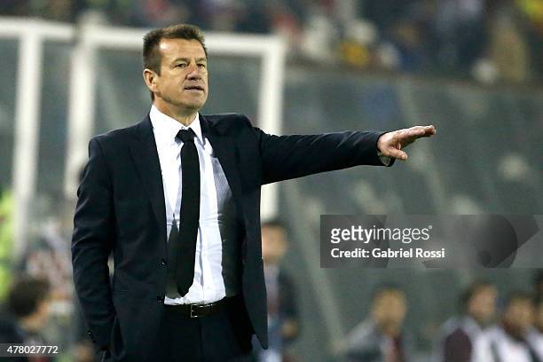 Dunga, coach of Brazil, gives instructions to his players during the 2015 Copa America Chile Group C match between Brazil and Venezuela at Monumental...