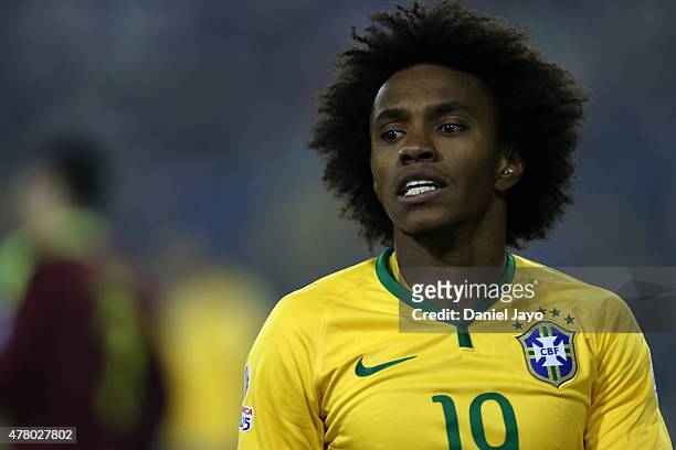 Willian of Brazil looks on during the 2015 Copa America Chile Group C match between Brazil and Venezuela at Monumental David Arellano Stadium on June...