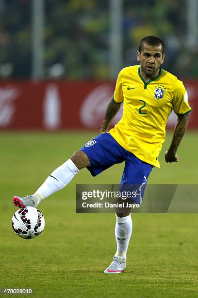 Dani Alves of Brazil controls the ball during the 2015 Copa America Chile Group C match between Brazil and Venezuela at Monumental David Arellano...