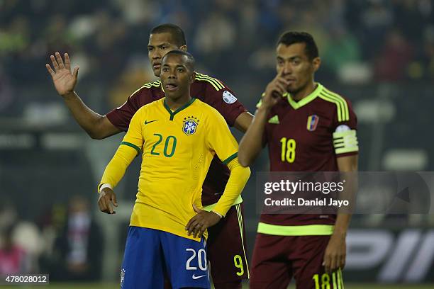Jose Salomon Rondon of Venezuela, Robinho of Brazil and Juan Arango of Venezuela look on during the 2015 Copa America Chile Group C match between...