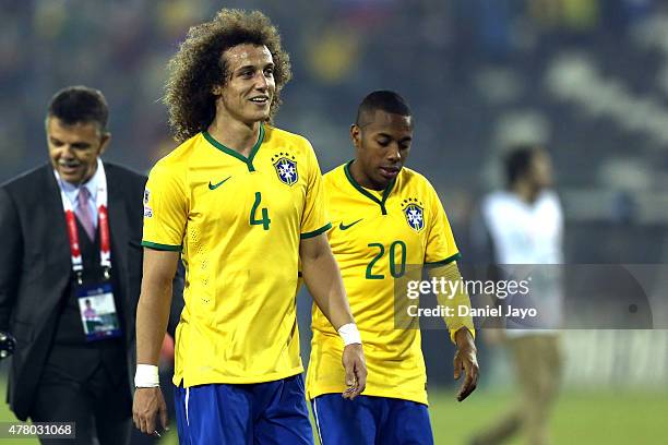 David Luiz and Robinho of Brazil of Brazil leave the field after the 2015 Copa America Chile Group C match between Brazil and Venezuela at Monumental...