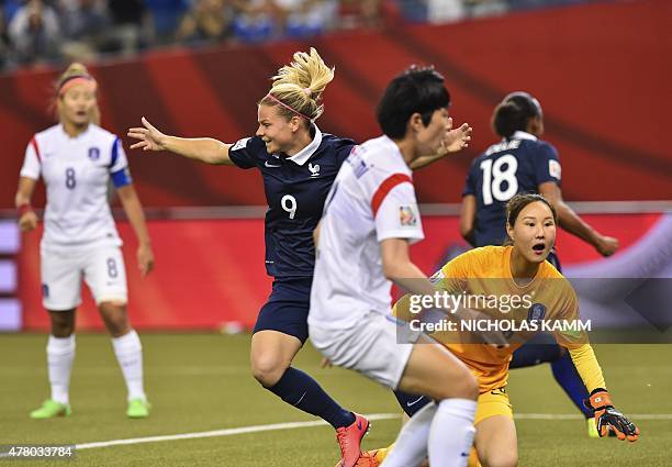 South Korea's goalkeeper Jun Minkyung , defender Lee Eunmi and Cho Sohyun react as France's Eugenie Le Sommer celebrates Marie-Laure Delie's first...