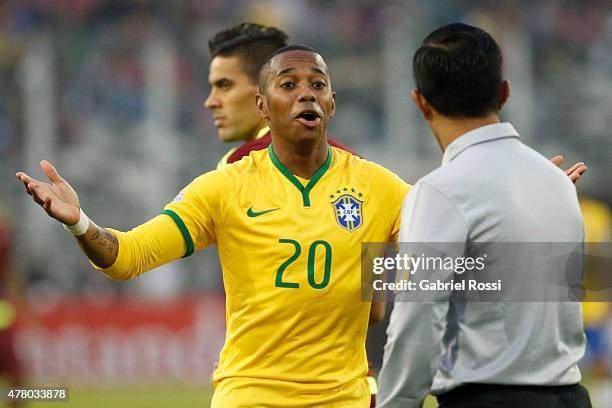 Robinho of Brazil appeals to referee Enrique Caceres during the 2015 Copa America Chile Group C match between Brazil and Venezuela at Monumental...