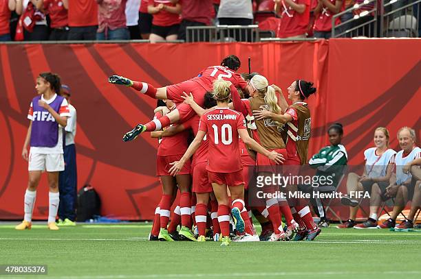 Canada players celebrate taking the lead during the FIFA Women's World Cup 2015 Round of 16 match between Canada and Switzerland at BC Place Stadium...