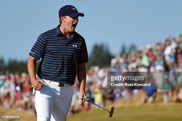 Jordan Spieth of the United States celebrates a birdie putt on the 16th green during the final round of the 115th U.S. Open Championship at Chambers...