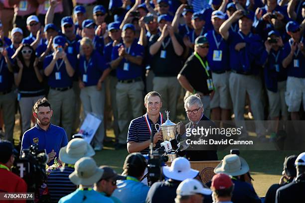 Jordan Spieth of the United States poses with the trophy alongside Thomas O'Toole, Jr., President of the USGA after Spieth won the 115th U.S. Open...