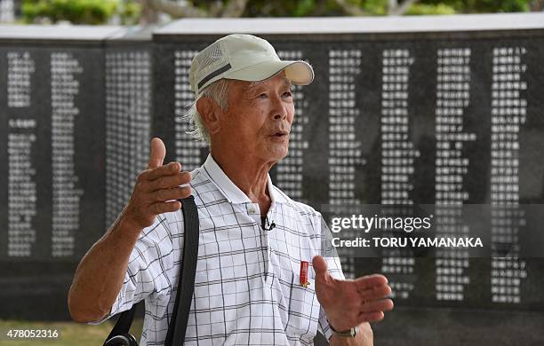 To go with Japan-US-WWII-Okinawa-anniversary by Alastair HIMMER War survivor Zenichi Yoshimine tells his experiences beside a monument commemorating...