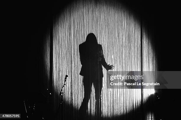 Carla Bruni performs on stage at L'Olympia on March 11, 2014 in Paris, France.