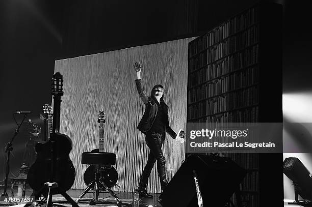 Carla Bruni performs on stage at L'Olympia on March 11, 2014 in Paris, France.