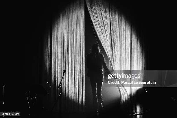 Carla Bruni performs on stage at L'Olympia on March 11, 2014 in Paris, France.