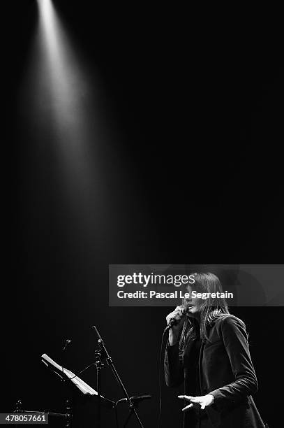 Carla Bruni performs on stage at L'Olympia on March 11, 2014 in Paris, France.