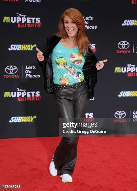 Actress Angie Everhart arrives at the Los Angeles premiere of "Muppets Most Wanted" at the El Capitan Theatre on March 11, 2014 in Hollywood,...