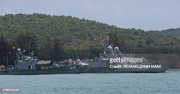 Two Vietnamese Navy ships are seen anchored at a local naval base from a fishing port at Phu Quoc island on March 12, 2014. Vietnam said on March 12...