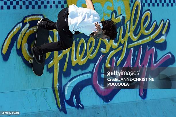 Argentinian skater Dario Mattarollo takes part in qualifying rounds of the French stage of the World Cup Skateboarding ISU during the Sosh Freestyle...
