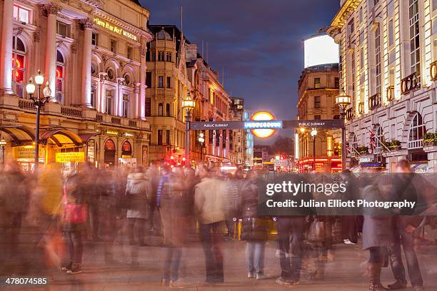 piccadilly circus in the city of london. - crowded underground london stock pictures, royalty-free photos & images