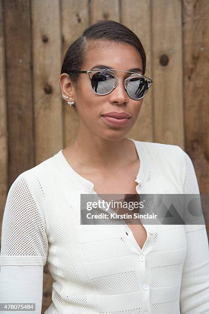 Lauren Preston of Burberry New York wears Burberry Prorsum dress, Dior sunglasses on day 4 of London Collections: Men on June 15, 2015 in London,...