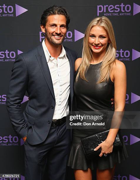 Tim Robards and Anna Heinrich pose at the Foxtel Presto launch at the Ivy on March 12, 2014 in Sydney, Australia.