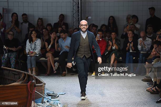 Designer Antonio Marras acknowledges the applause of the public after the Antonio Marras fashion show as part of Milan Men's Fashion Week...