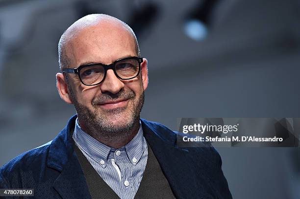 Designer Antonio Marras acknowledges the applause of the public after the Antonio Marras fashion show as part of Milan Men's Fashion Week...