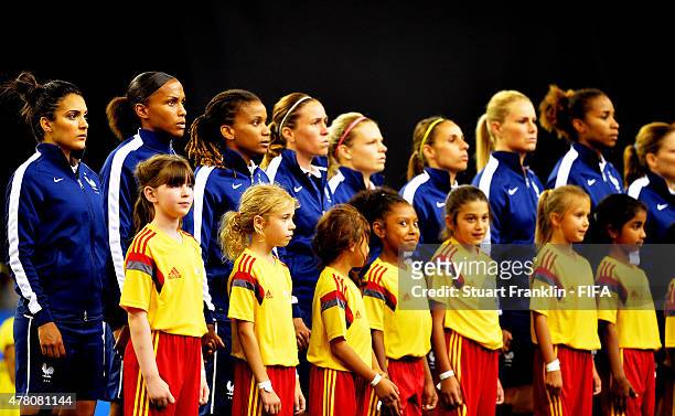 The players of France line up during the FIFA Womens's World Cup round of 16 match between France and Korea at Olympic Stadium on June 21, 2015 in...