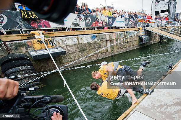 Abu Dhabi Ocean Racing team celebrates after arriving in Gothenburg at the end of Leg 9 of the Volvo Ocean Race from Lorient to Gothenburg to win the...