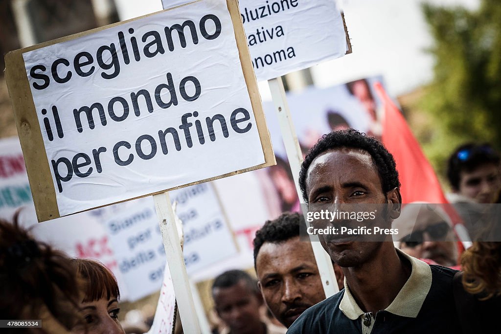 Demonstrators take part in a rally to show solidarity for...