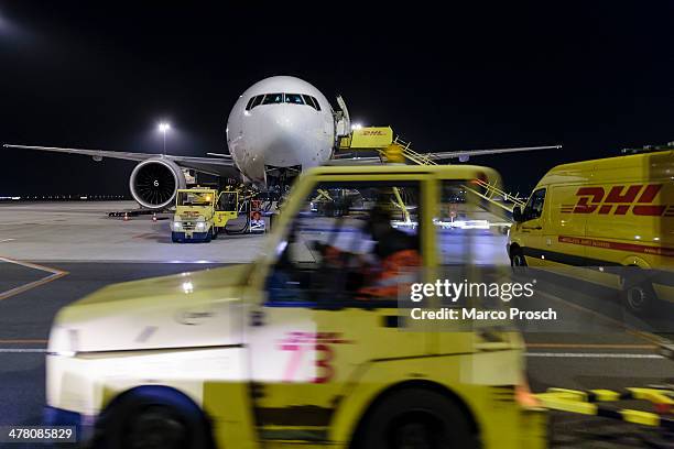 Cargo planes are being unloaded at Halle-Leipzig Airport on February 27, 2014 in Leipzig, Germany. The soon to be expanded hub handles 2,000 tons of...