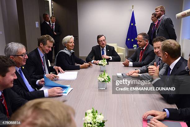 Eurogroup President and Dutch Finance Minister Jeroen Dijsselbloem , International Monetary Fund Managing Director Christine Lagarde , European...