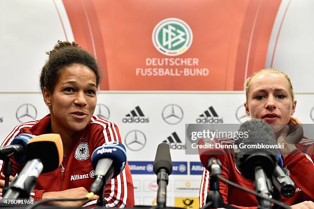 Celia Sasic and Pauline Bremer of Germany face the media during a press conference at Montreal Convention Centre on June 22, 2015 in Montreal, Canada.