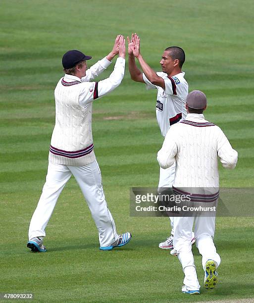 Alfonso Thomas of Somerset celebrates with team mates after taking the wicket of James Adams of Hampshire during the the LV County Championship match...