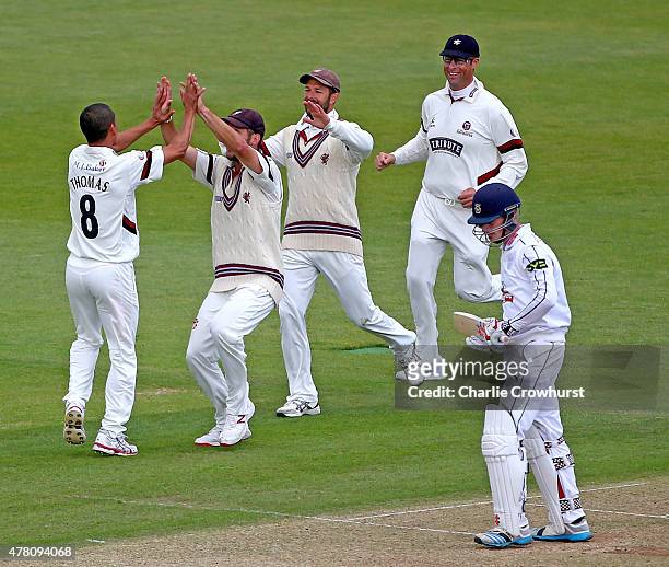 Alfonso Thomas of Somerset celebrates with team mates after taking the wicket of Sean Terry of Hampshire during the the LV County Championship match...